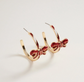 “All Tied Up” Holiday Bow Hoop Earrings image 0