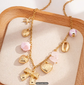 Golden Charm & Blush Bead Necklace image 1
